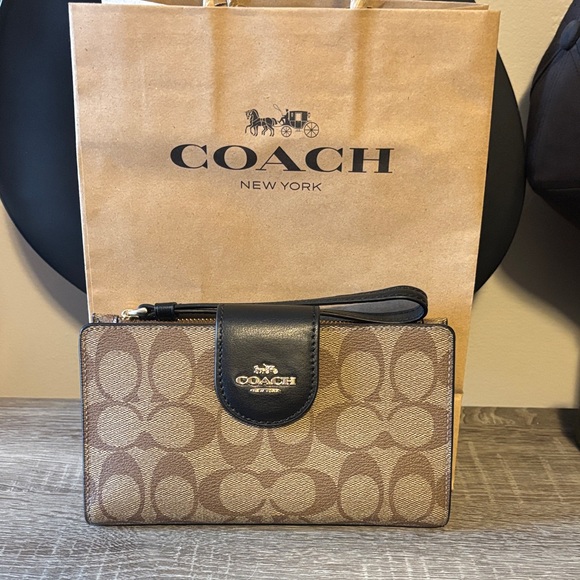 Coach Handbags - Coach Phone Wallet in Signature Brown and Black Wristlet